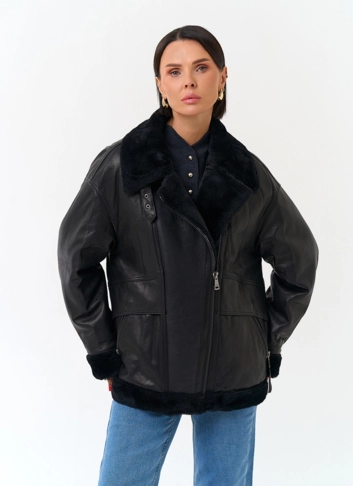 Женский пуховик из натуральной кожи фото